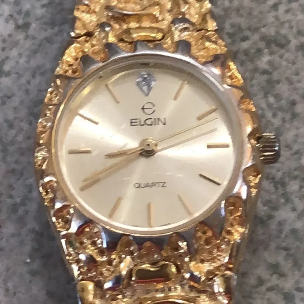 Vintage Elgin Gold nugget ladies watch.